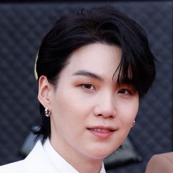 Modern K-Pop Mullet hairstyle for oval face shape - men's medium wavy hair